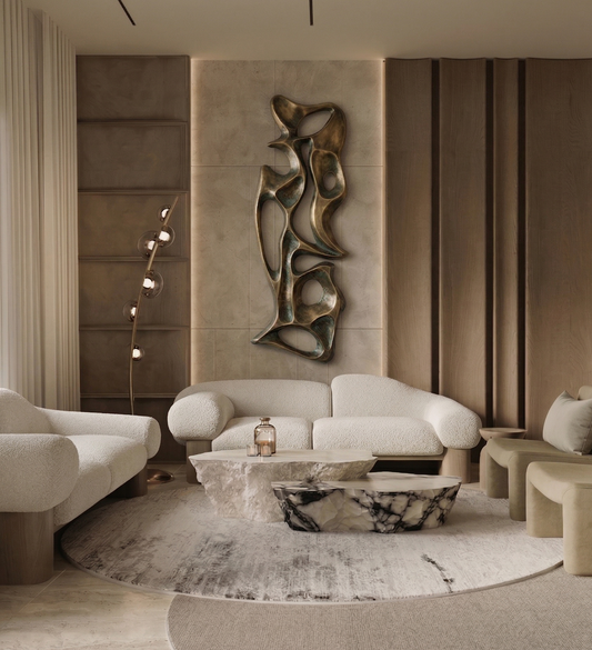 Modern living room with abstract wall sculpture and neutral color palette