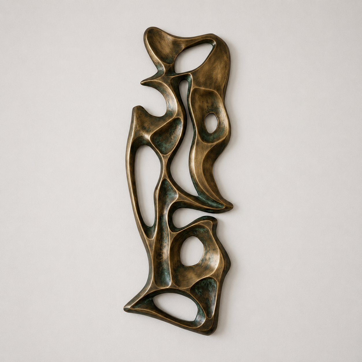 Bronze abstract sculpture on a light gray background