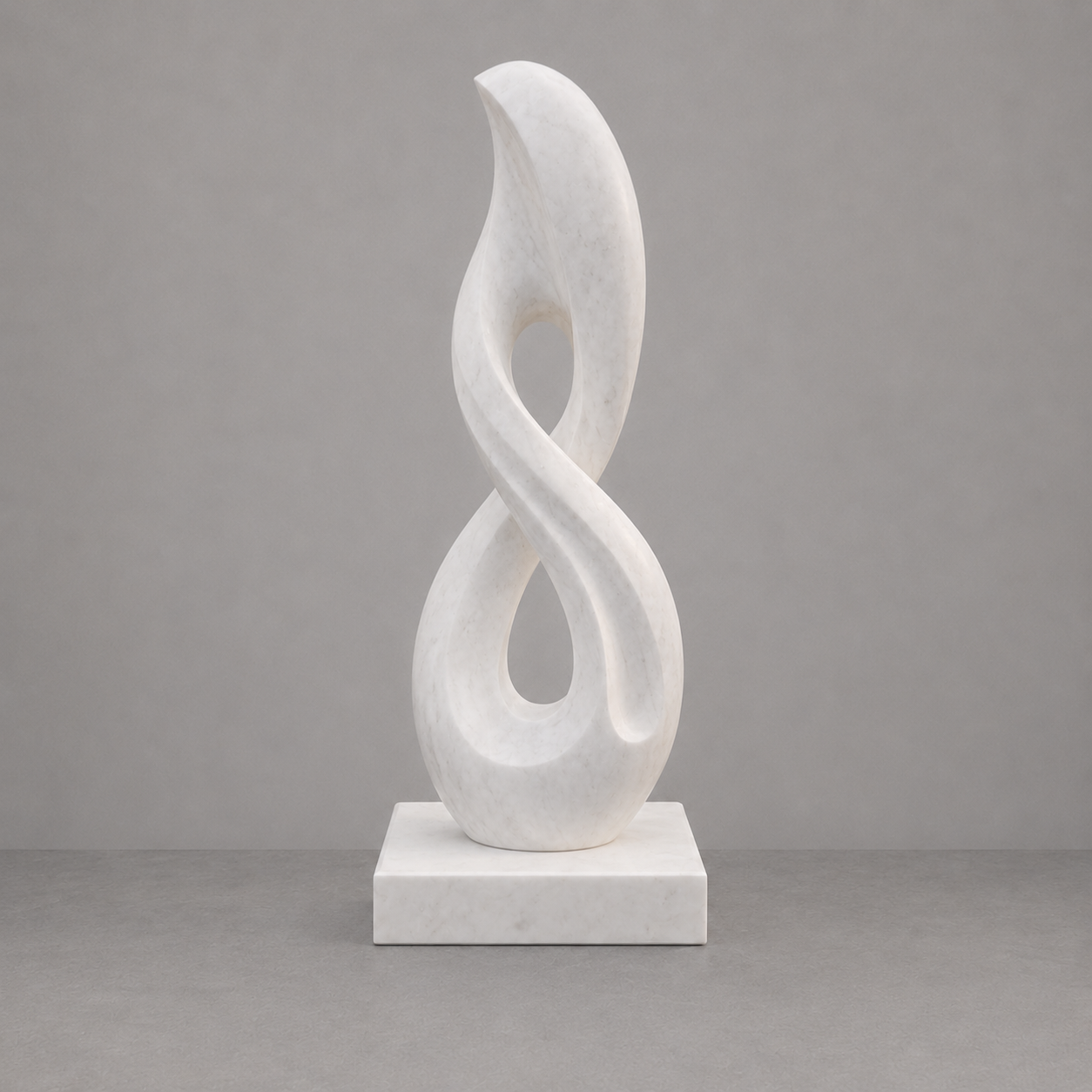 White marble sculpture on a gray background