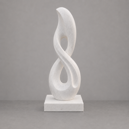 White marble sculpture on a gray background