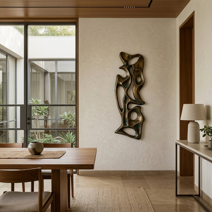 Dining room with wooden table, chairs, and decorative wall art.