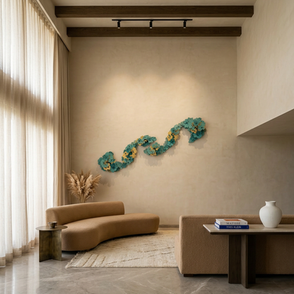 Modern living room with a curved brown sofa, decorative wall piece, and a vase.