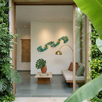 Modern indoor living space with plants and a sofa
